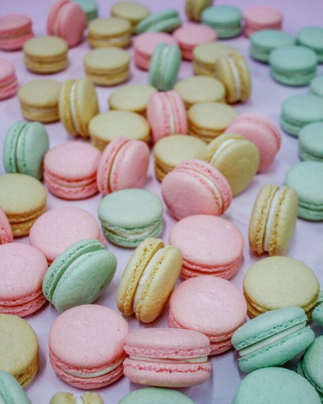 MACARONS
🩷💚💛
If you have followed my career you will know that macarons have been part of my repertoire since way back when.
My love for macarons started in 2007 when I was working as a chef on the yachts in the Med, and my favourite things was admiring the rows and towers of colourful macarons in the pattiseries in Cannes, Nice, and St. Tropez. 
At that stage it was almost impossible to find an English recipe (we were in France after all!) and that started a love affair for these little fancy French cookies - I just had to perfect them. And boy did I.
...
 In 2015 macarons were still a very new thing in SA (and I was still living in the UK). I travelled back and presented a host of sell out macaron masterclasses in Cape Town, Johannesburg, and even in Nelspruit, where I grew up. I loved this - and I know some people still follow my recipe (It's also available in my cookbook)
...
Please don't go to the Waterfront and pay R45 for macaron 😅. We sell maccies on our online store and they cost pretty much more than half of that! They are the perfect little treat as an add on to your cake order
🩷💚💛